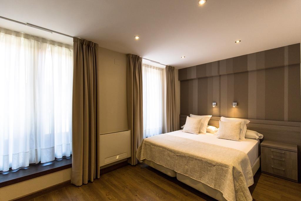 Apartamentos Turisticos Llanes Pokoj fotografie